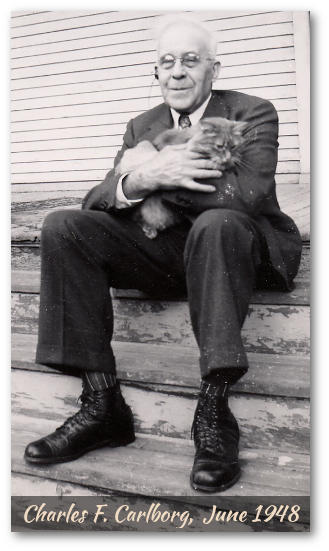 Charlie Carlborg with friendly cat,1948